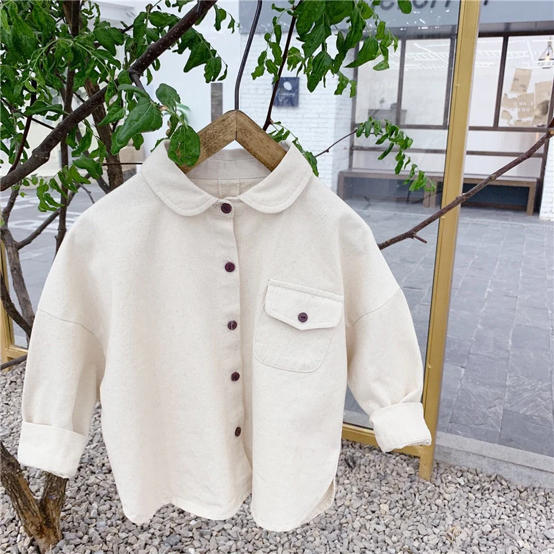 Chemise nude avec écriture au dos